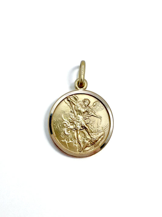 Gold pendant of St. Michael